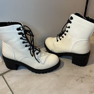 White and black combat boots